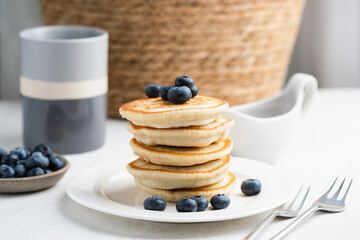 Stack of fluffy buttermilk pancakes, closeup view