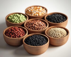 Assortment of dry beans and frains in wooden bowls