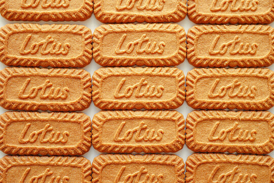 White table filled with Lotus Biscoff , Belgium cookies with caramel flavor that go well with coffee
