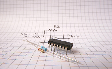 Electronic components on acircuit drawing. Industrial projects or engineering education concept....