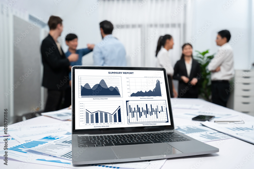 Fototapete Analytic database by BI Fintech dashboard displayed on laptop for analyzed financial data on blur background with business people analyzing for insights power into business marketing planning.Prudent