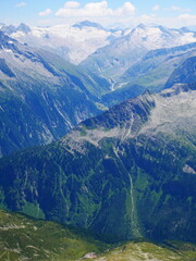 View on jagged mountains and glaciers of Zillertal alps on a summer day