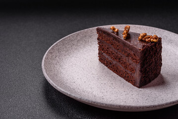 Piece of sweet chocolate cake with nuts