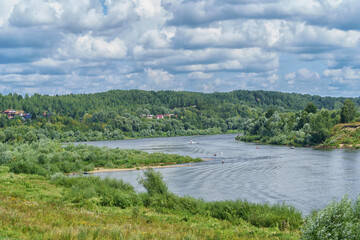 Russian Oka river a clear summer day under beautiful dramatic sky.