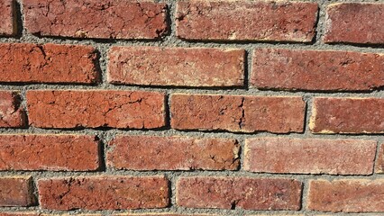 mur de brique rouge en gros plan