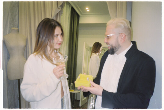 Engagement Photo of Gen Z groom proposing cute young lady