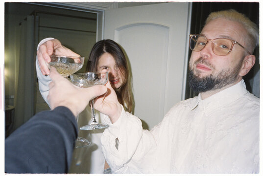 Happy friends toasting in user generated style