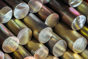 Close-up of a stack of steel rods, a raw material of the metallurgical industry