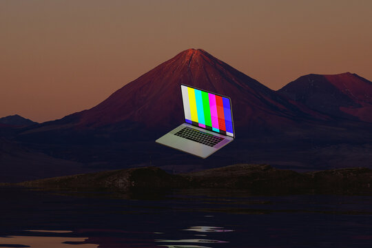 Multicolored laptop screen floating in air