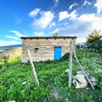 Blue door retreat on the countryside