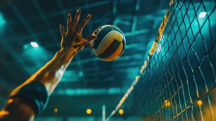 Close-up of a volleyball player's hand reaching for the ball during a game.