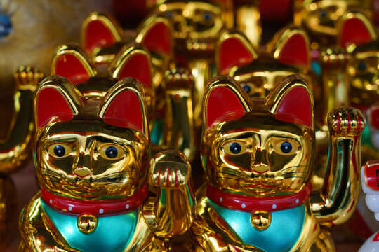 Golden cat figurines