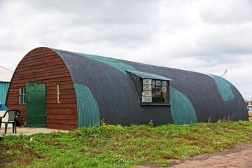 Historic world war two hangar on an airfield