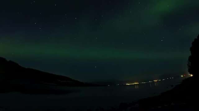 Extremely wide-angle timelapse video of green aurora borealis in Norway, near Narvik.  