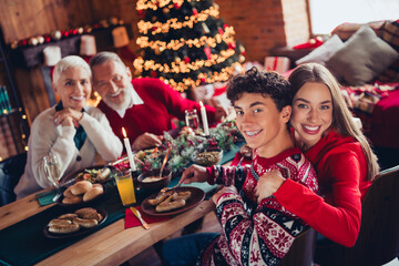 Photo of big full family cuddle eat food gather celebrate christmas home apartment indoors