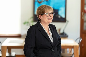 Smiling Real Estate Agent in Office