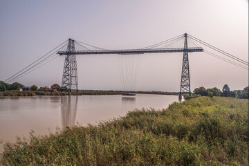 Transporter bridge crossing a river in Rochefort, Charente, France