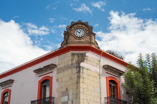 Oaxaca Typical colonial architecture with wall clock 