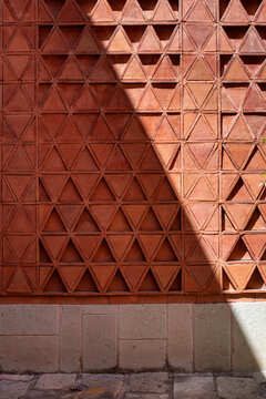 Oaxaca details wall with triangle shadow