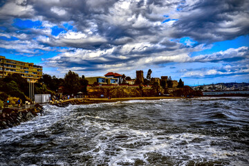 Mandelieu-La Napoule, France - September 7th 2024 : View of the castle of Mandelieu-La Napoule. The sea is restless, there are many waves.