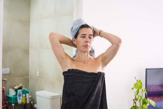 Woman coming out of the shower
