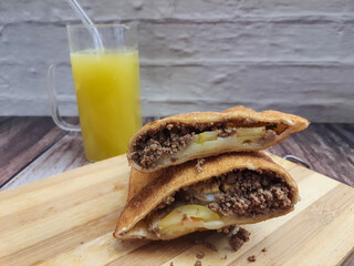 Pastel with sugarcane juice, Brazilian snack.