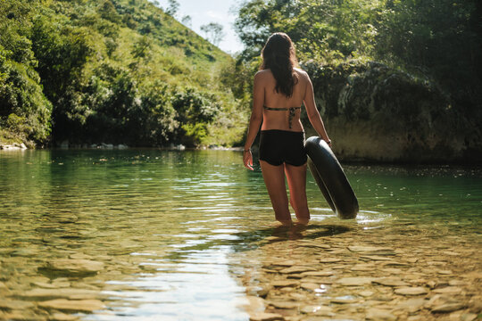 woman enjoying nature in a river