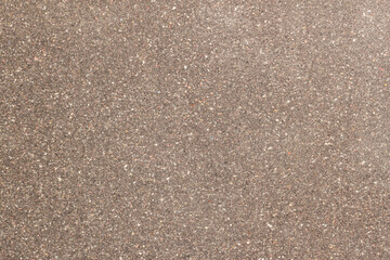 Smooth, natural stone surface, blend of earthy brown tones with subtle patterns