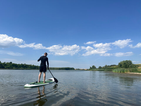 Man Enjoying Relaxing Activity on a Lake