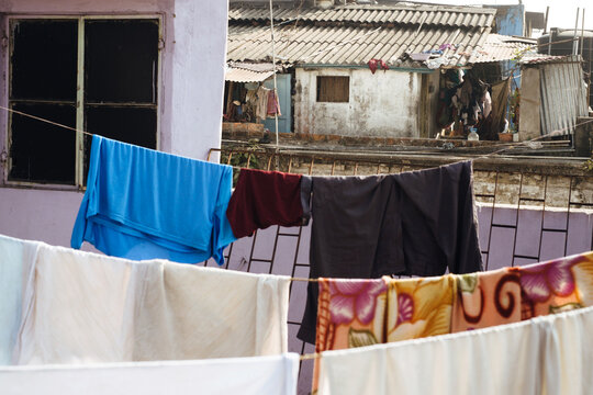 Laundry drying on clotheslines in an urban neighborhood
