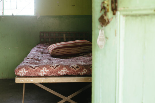 Bedroom interior with a mattress and pillow in a quiet space