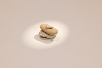 Overhead View of Ashwagandha Pill Arranged on Stones