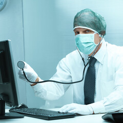 Medical professional examines tech with clinical approach
