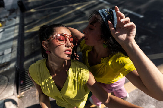 Street dancers performing on yellow lines