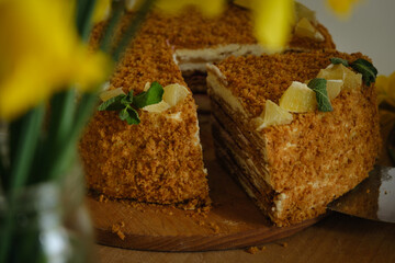 Lemon cake with green tea and yellow flowers