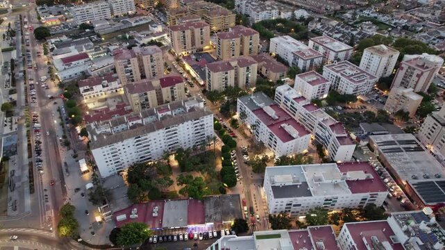 Aerial view of a city neighborhood with residential buildings and urban infrastructure, San Pedro Alcantara, Marbella, Malaga, Andalucia, Spain