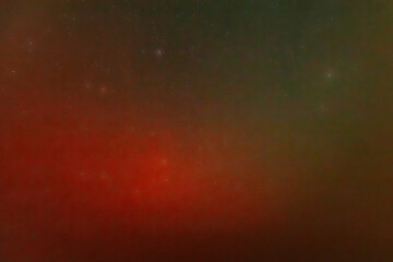 A peaceful night sky filled with faint stars and a soft red aurora glow near the horizon. The...