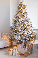 An Elegant Christmas Tree beautifully positioned in a Modern Living Room, adorned with Gifts
