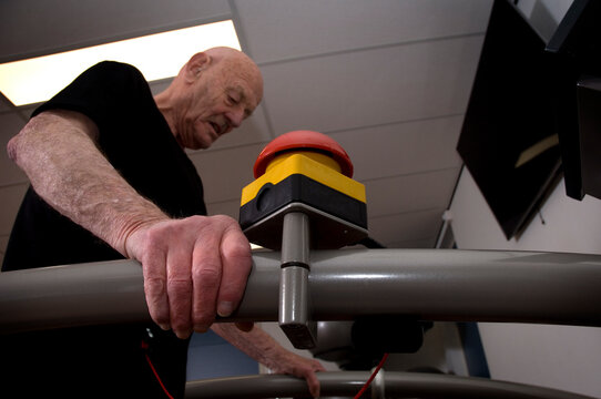 Elderly man doing fitness