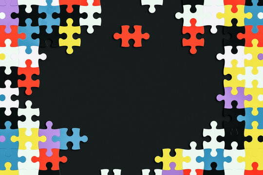 Colorful Jigsaw Puzzle Pieces form the Frame