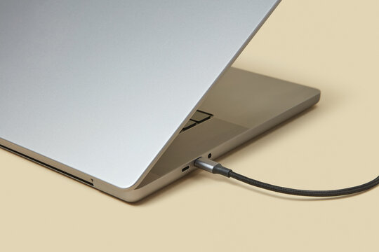 Wire plugged in hole of modern pc and saving energy of battery