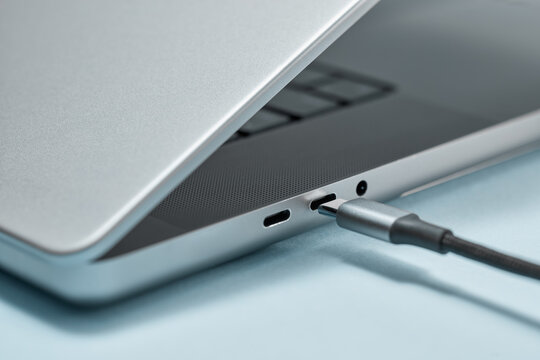 Computer getting connected with unseen device with little black cord