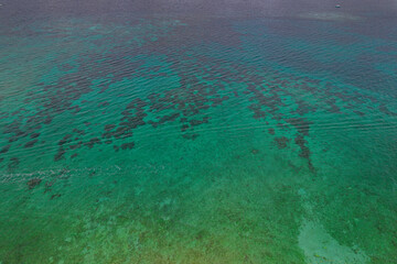 Aerial view of  the beautiful Bora Bora island and Island de Rosario turquoise waters, Resorts and yachts in Cartagena.