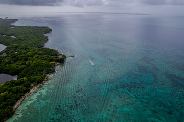 Aerial view of  the beautiful Bora Bora island and Island de Rosario turquoise waters, Resorts and yachts in Cartagena.