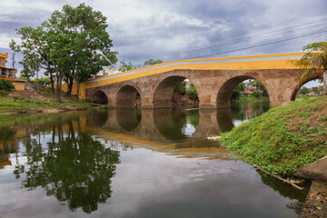 Fototapeta premium The reflection of Yayabo bridge - Sancti Spiritus, Cuba
