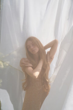Ethereal Portrait of a Woman in Soft Drapery