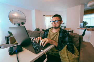 Portrait of a man in his 30's making a funny face.