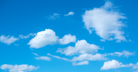 Amazing white clouds. Clear sky. Cloudiness. Warm summer day.