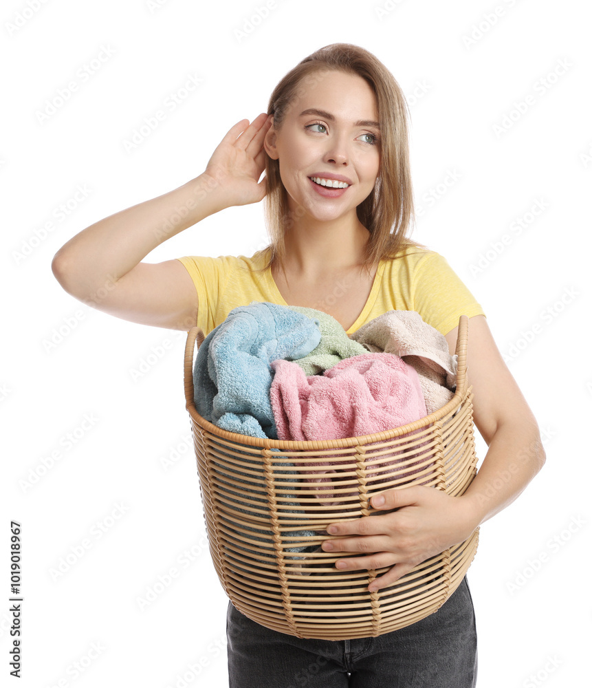 Canvas Prints Happy young housewife with basket full of laundry on white background