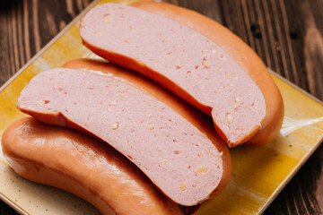 Close-up of sliced sausages with visible texture, food photography and culinary advertising